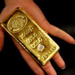 Gold Pulls Back to $3,297 as Dollar Rebounds and Stocks Rise — Investors Eye U.S. Economic Data and Key Technical Support