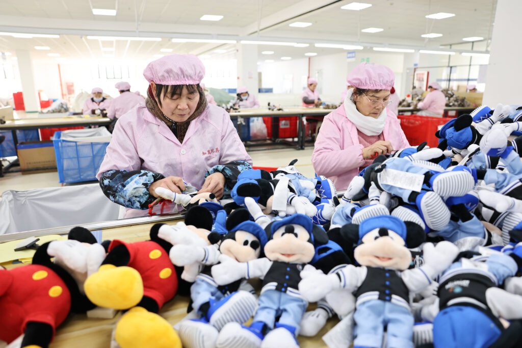 China’s Manufacturing Hits 12-Month High in March, Offset by Looming US Tariffs