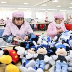 China’s Manufacturing Hits 12-Month High in March, Offset by Looming US Tariffs